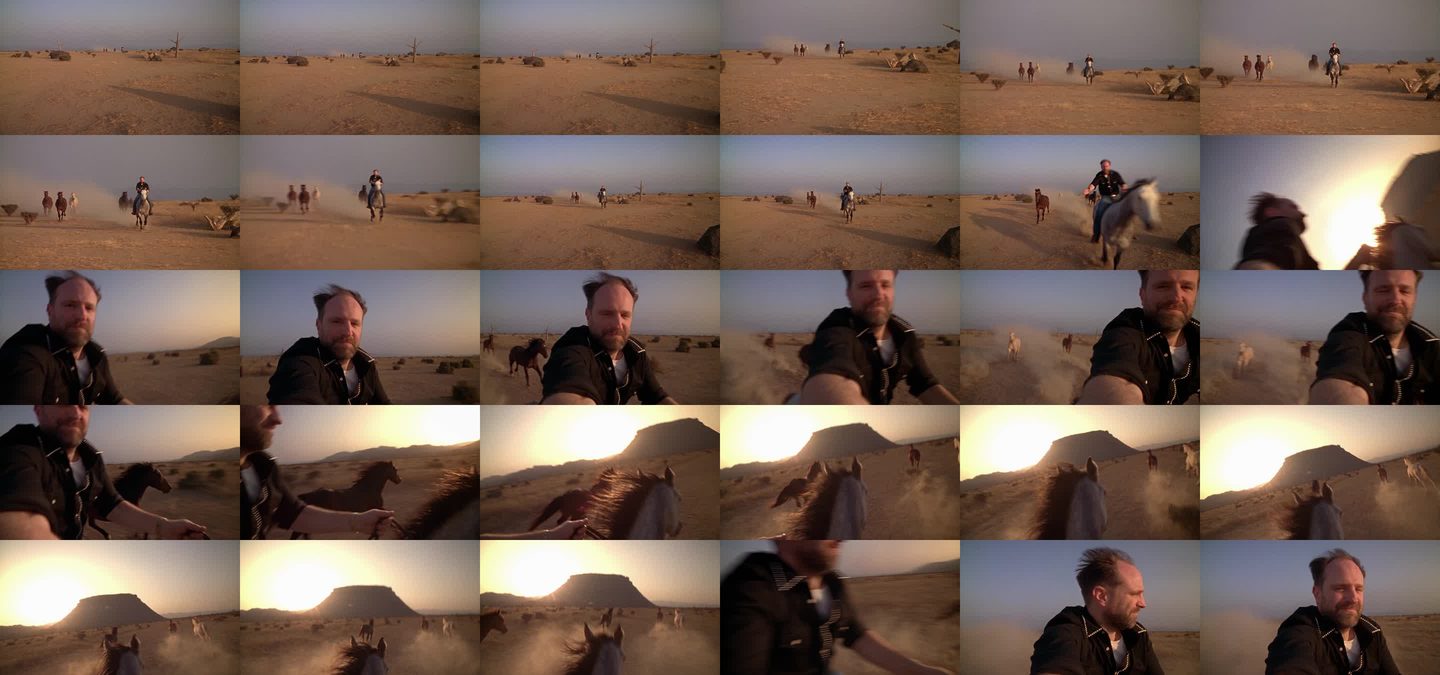 Contact sheet of the final Seedance take, every half second: distant approach, herd behind, reach, grab whip, selfie, horses overtaking on both sides, herd ahead toward the mesa, back to face